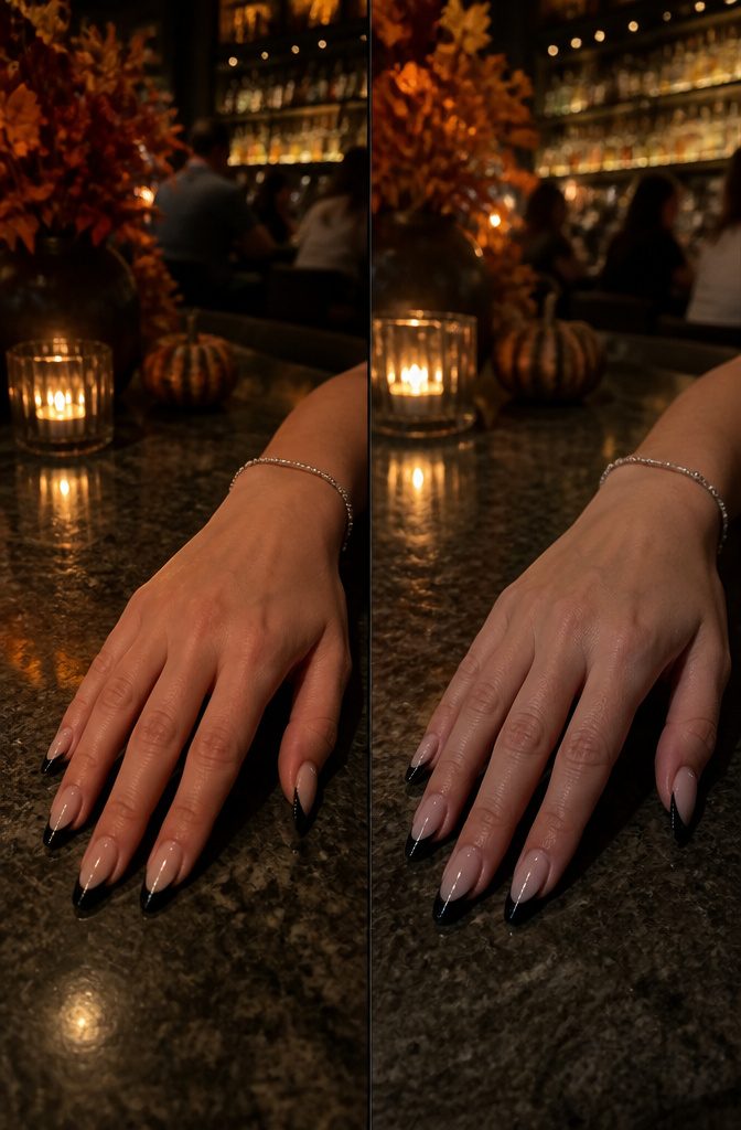 A hand with Halloween-themed French tips in a gothic-themed restaurant.